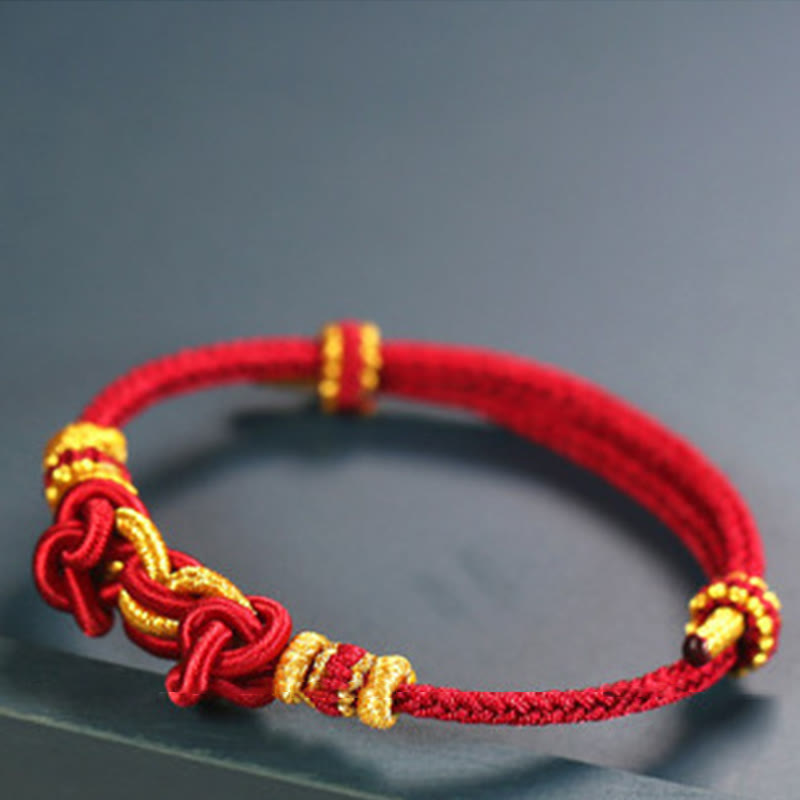 Pulsera de nudo de silla de montar con hilo rojo y piedras de Buda