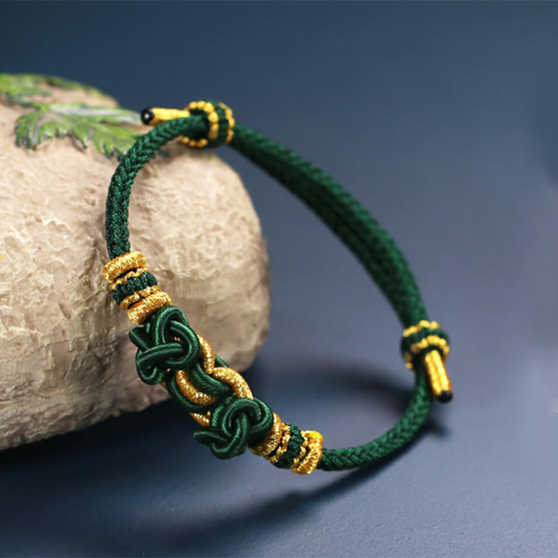 Pulsera de nudo de silla de montar con hilo rojo y piedras de Buda