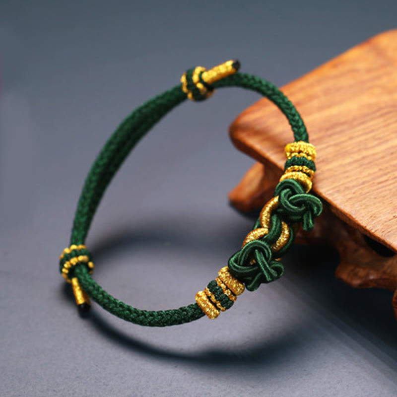 Pulsera de nudo de silla de montar con hilo rojo y piedras de Buda