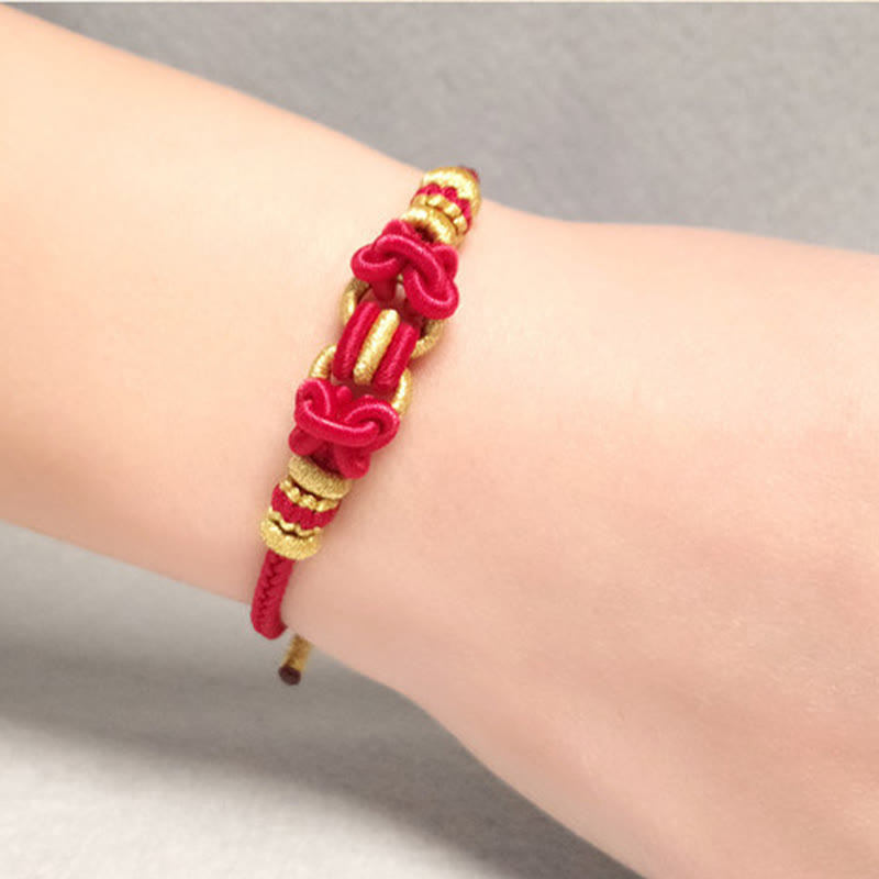 Pulsera de nudo de silla de montar con hilo rojo y piedras de Buda