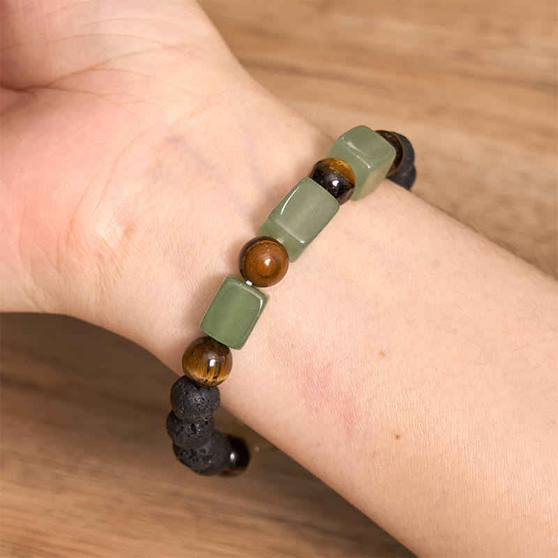 Pulsera de piedra de lava con cristales variados y piedras de Buda
