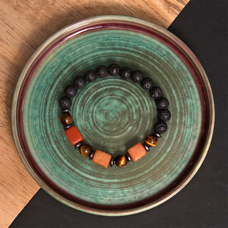 Pulsera de piedra de lava con cristales variados y piedras de Buda