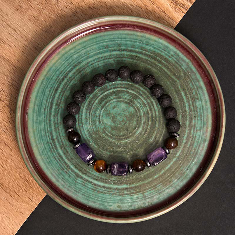 Pulsera de piedra de lava con cristales variados y piedras de Buda