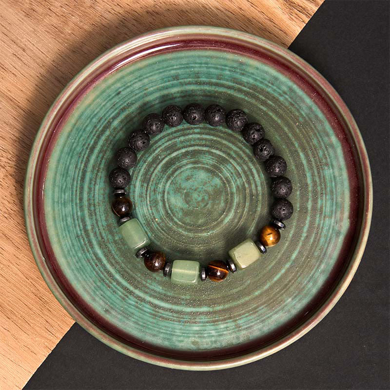 Pulsera de piedra de lava con cristales variados y piedras de Buda
