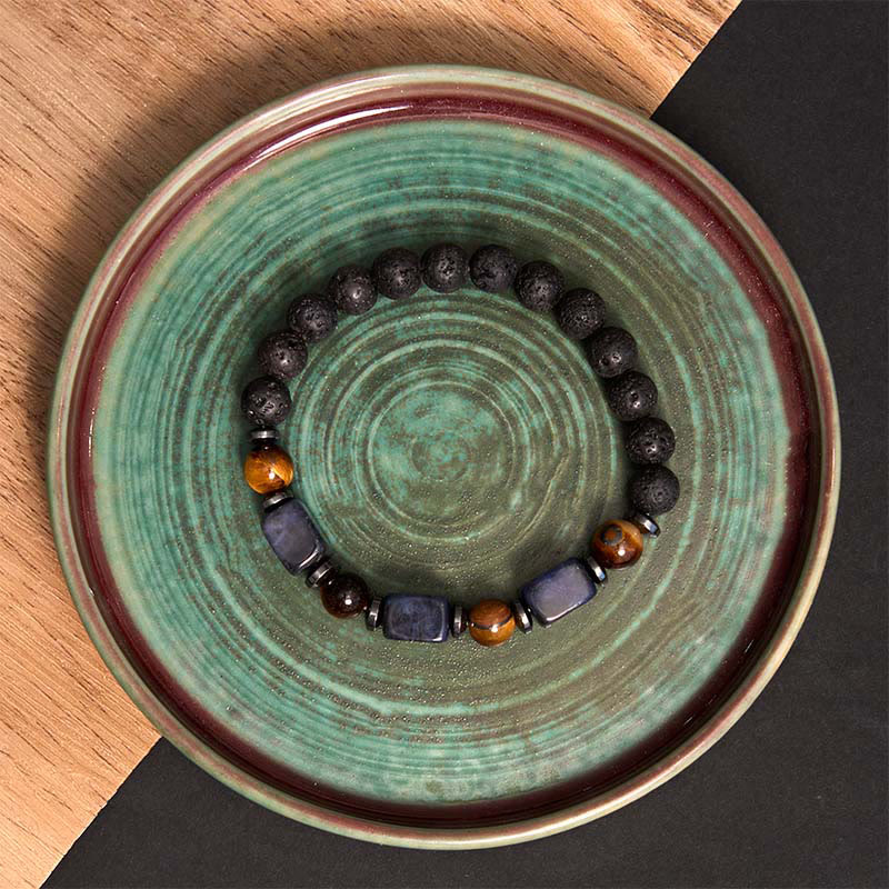 Pulsera de piedra de lava con cristales variados y piedras de Buda
