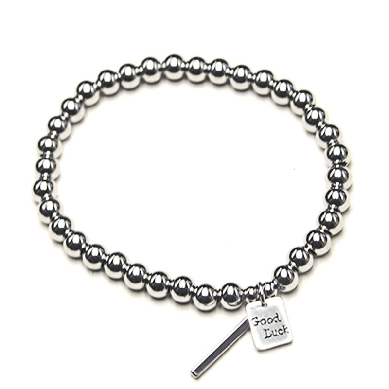 Pulsera de equilibrio de la buena suerte de acero y titanio con piedras de Buda