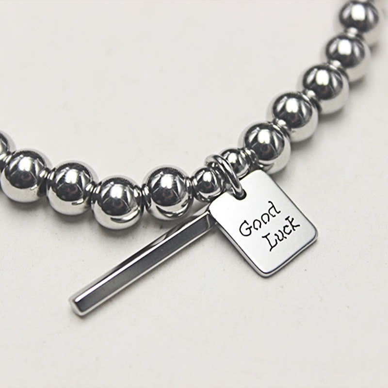 Pulsera de equilibrio de la buena suerte de acero y titanio con piedras de Buda
