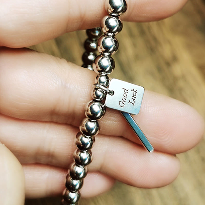 Pulsera de equilibrio de la buena suerte de acero y titanio con piedras de Buda