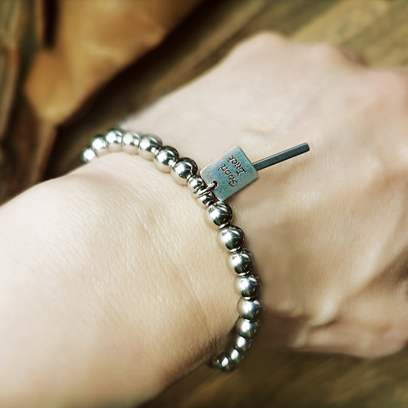 Pulsera de equilibrio de la buena suerte de acero y titanio con piedras de Buda