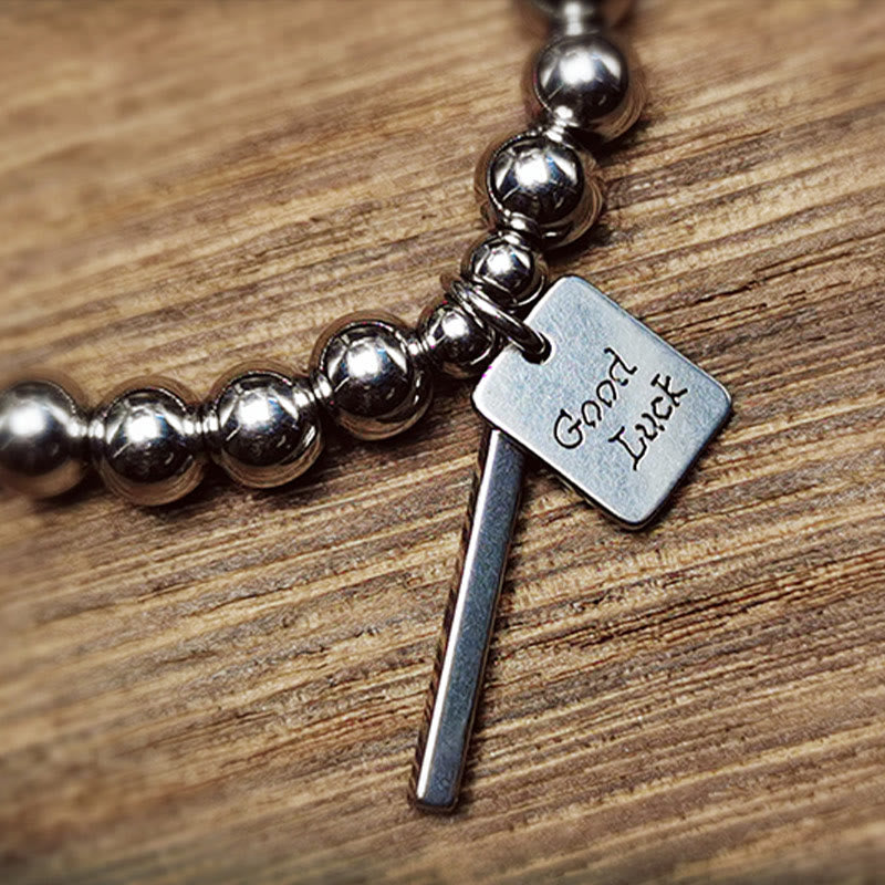 Pulsera de equilibrio de la buena suerte de acero y titanio con piedras de Buda