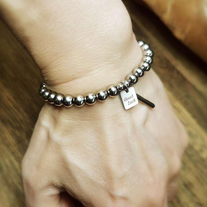 Pulsera de equilibrio de la buena suerte de acero y titanio con piedras de Buda