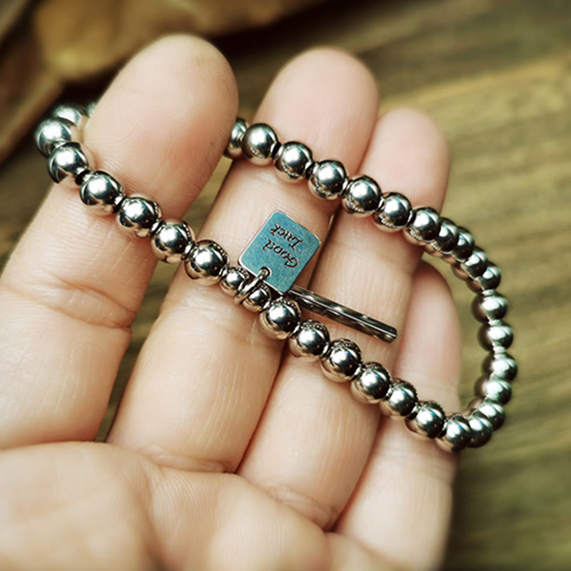 Pulsera de equilibrio de la buena suerte de acero y titanio con piedras de Buda