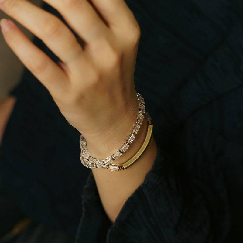 Pulsera de cobre con cristales blancos y piedras de Buda cuadradas