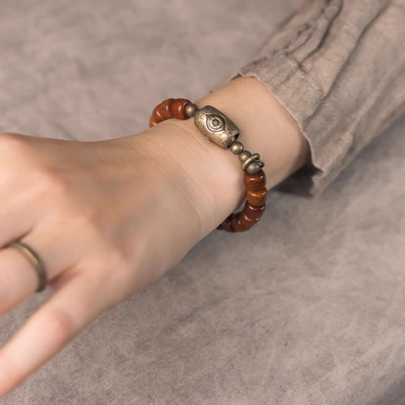 Pulsera de fuerza con colgante de cono de cobre y hueso de yak de Buda