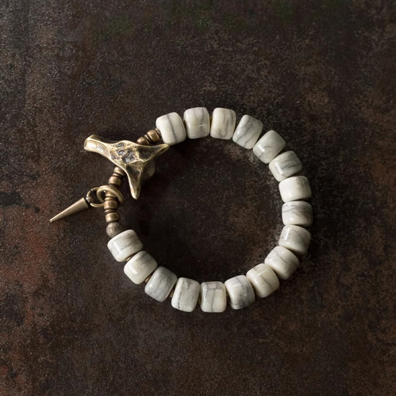Pulsera de equilibrio con colgante de cabeza de yak de cobre y hueso de yak blanco con piedras de Buda