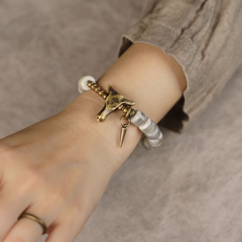 Pulsera de equilibrio con colgante de cabeza de yak de cobre y hueso de yak blanco con piedras de Buda