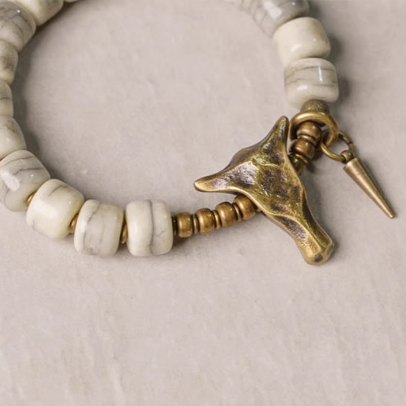 Pulsera de equilibrio con colgante de cabeza de yak de cobre y hueso de yak blanco con piedras de Buda