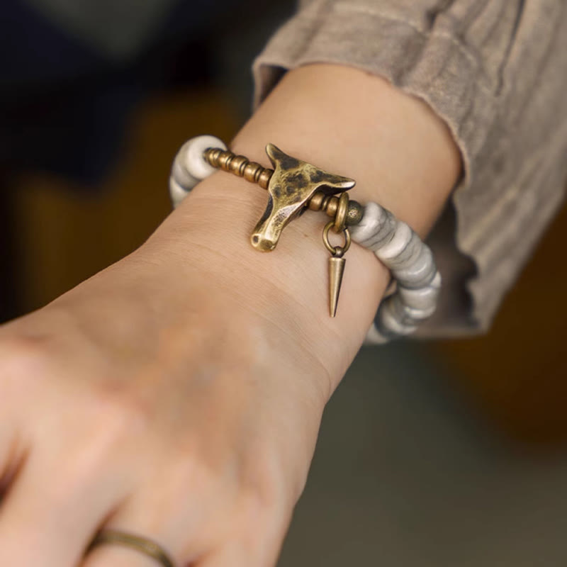 Pulsera de equilibrio con colgante de cabeza de yak de cobre y hueso de yak blanco con piedras de Buda
