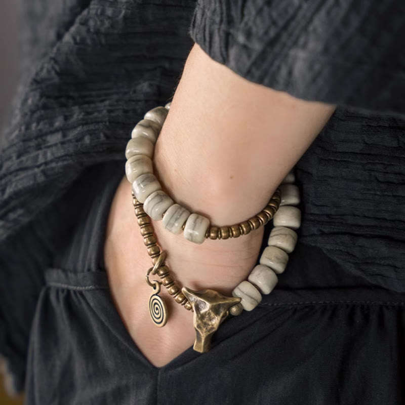 Buddha Stones Weißer Yakknochen Kupfer Yakkopf Doppelwickel-Balancearmband