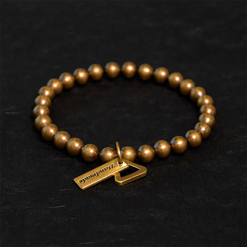 Pulsera de equilibrio con cuentas de cobre y piedras de Buda