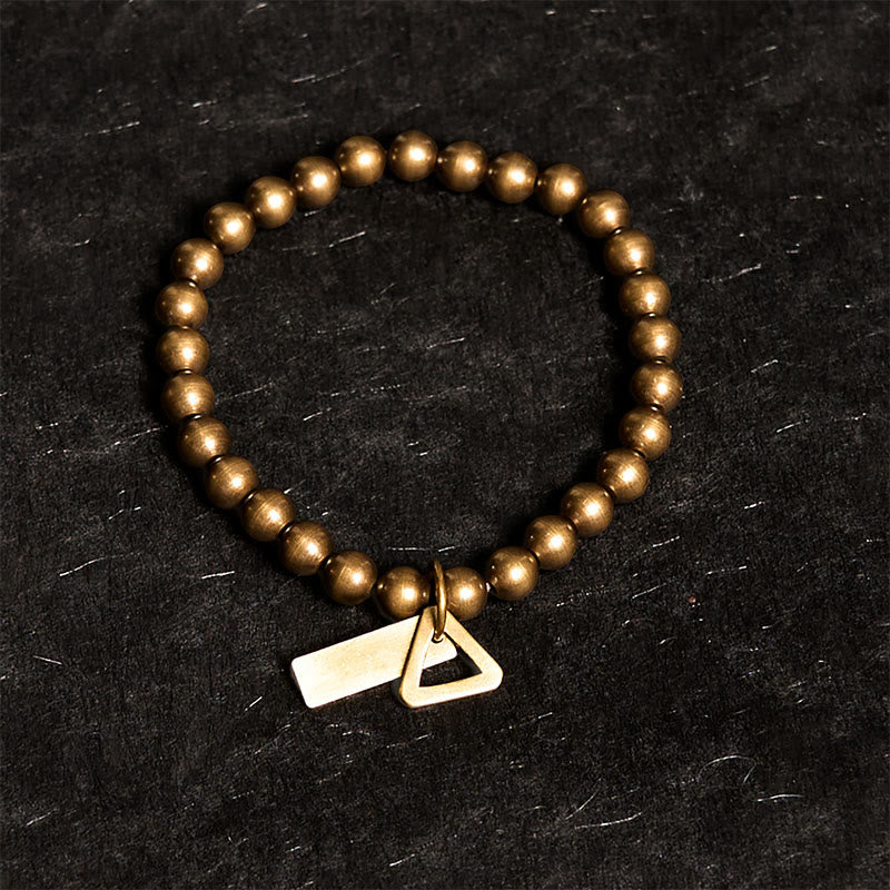 Pulsera de equilibrio con cuentas de cobre y piedras de Buda