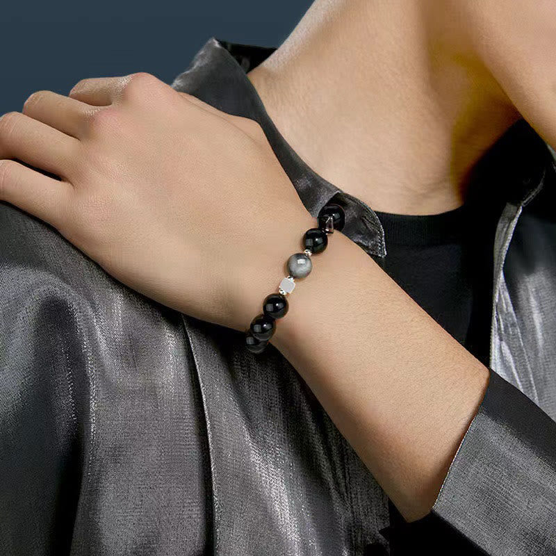 Pulsera de fuerza con obsidiana negra, ojo de águila y obsidiana dorada con brillo de ojo de tigre.