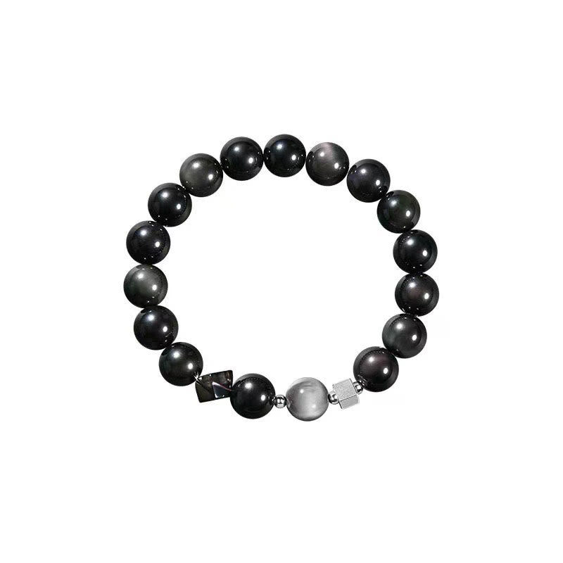 Pulsera de fuerza con obsidiana negra, ojo de águila y obsidiana dorada con brillo de ojo de tigre.