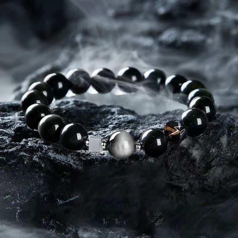 Pulsera de fuerza con obsidiana negra, ojo de águila y obsidiana dorada con brillo de ojo de tigre.