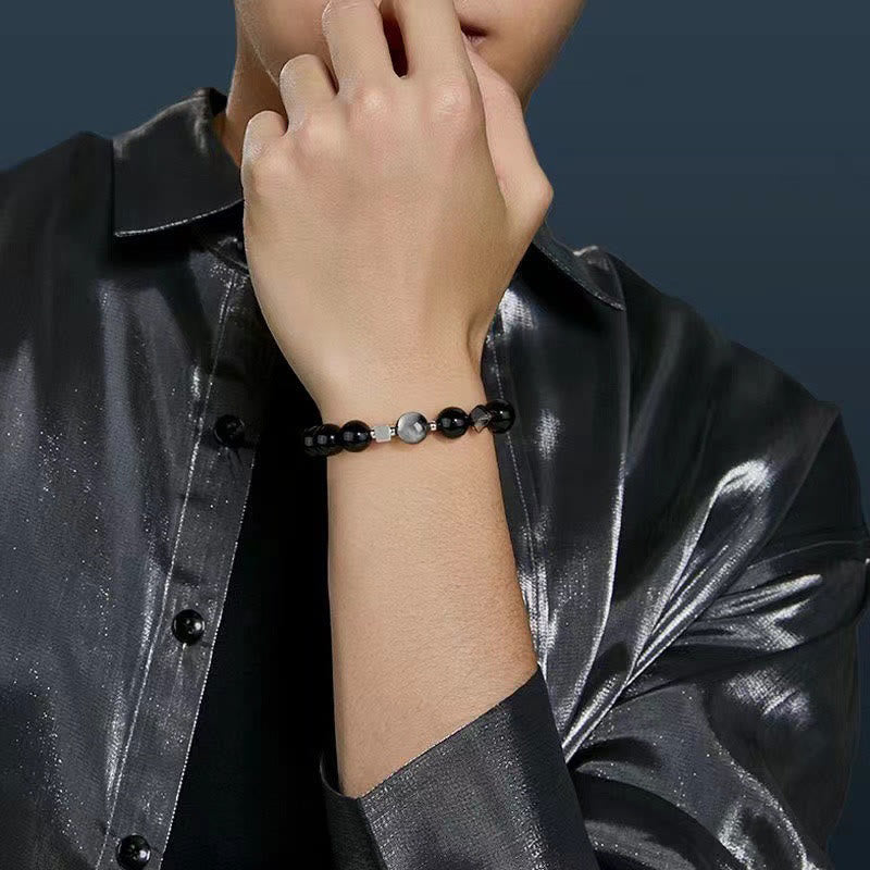 Pulsera de fuerza con obsidiana negra, ojo de águila y obsidiana dorada con brillo de ojo de tigre.