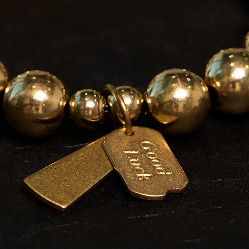 Pulsera curativa de cobre con piedras de Buda