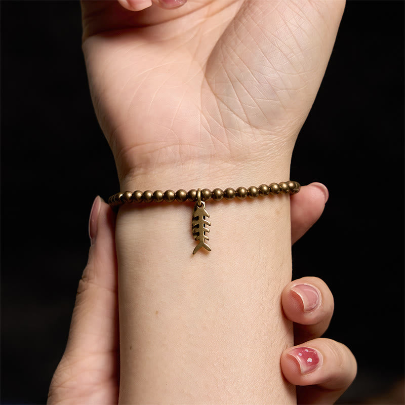 Pulsera curativa de espina de pescado de cobre con piedras de Buda