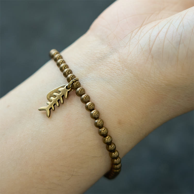Pulsera curativa de espina de pescado de cobre con piedras de Buda