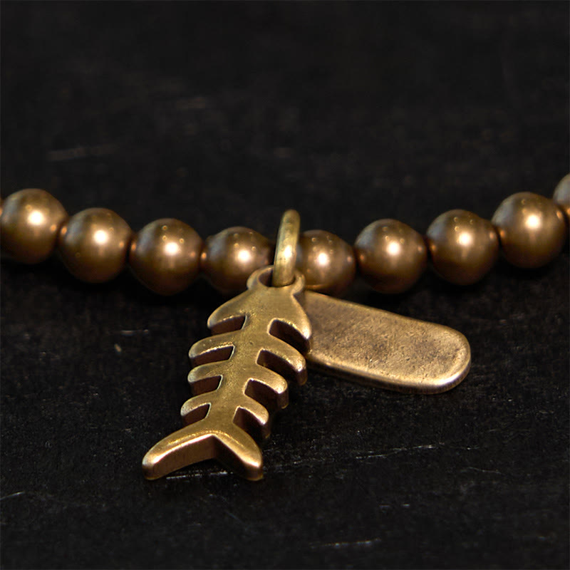 Pulsera curativa de espina de pescado de cobre con piedras de Buda