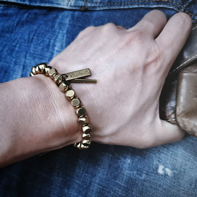 Pulsera curativa de cobre con piedras de Buda