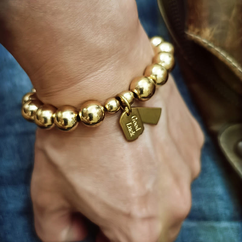 Pulsera curativa de cobre con piedras de Buda