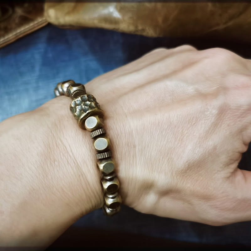 Pulsera de equilibrio con diseño de meteorito de cobre y piedras de Buda