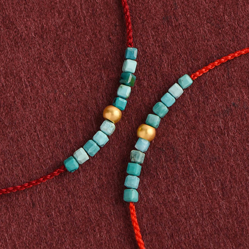 Pulsera trenzada con cuentas de oro 999 y turquesa para protección del tobillo.