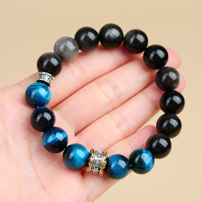 Pulsera de obsidiana plateada con ojo de tigre azul y piedras de Buda
