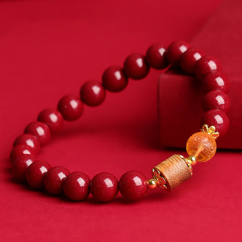 Pulsera de bendición de ámbar, cinabrio y madera de agar con piedras de Buda