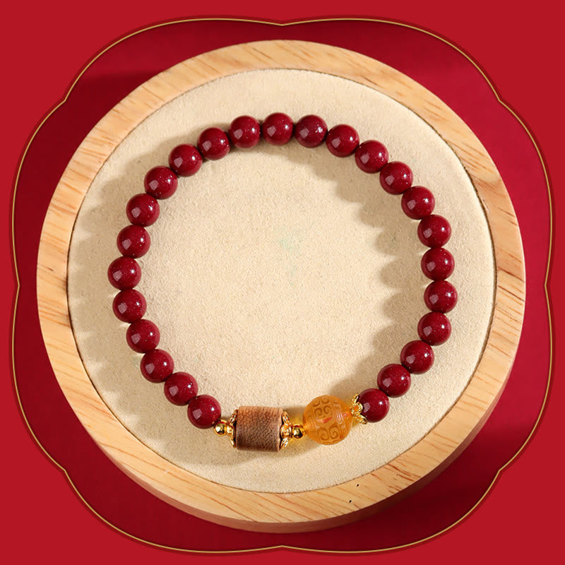 Pulsera de bendición de ámbar, cinabrio y madera de agar con piedras de Buda