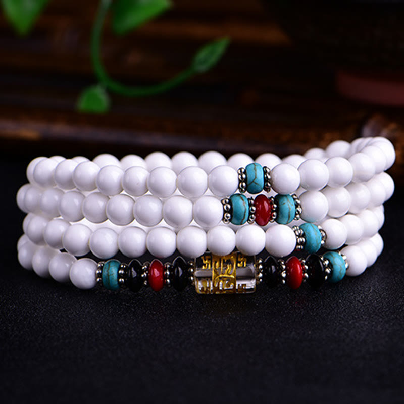 Pulsera de la paciencia con seis palabras verdaderas "Om Mani Padme Hum" de porcelana blanca con 108 cuentas de mala de Buda
