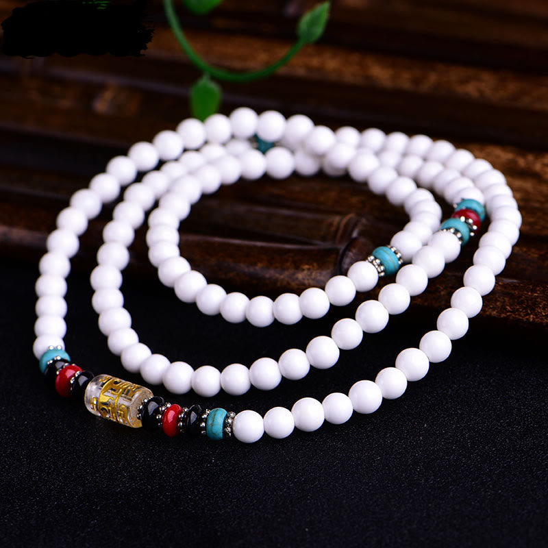 Pulsera de la paciencia con seis palabras verdaderas "Om Mani Padme Hum" de porcelana blanca con 108 cuentas de mala de Buda