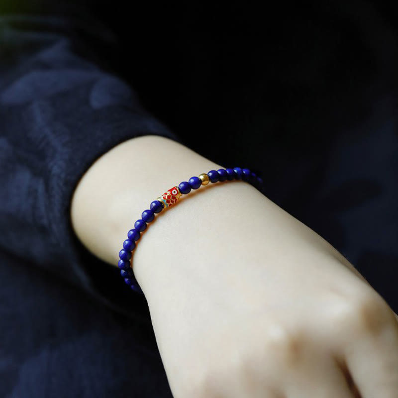 Pulsera positiva de pez koi con lazurita y piedras de Buda