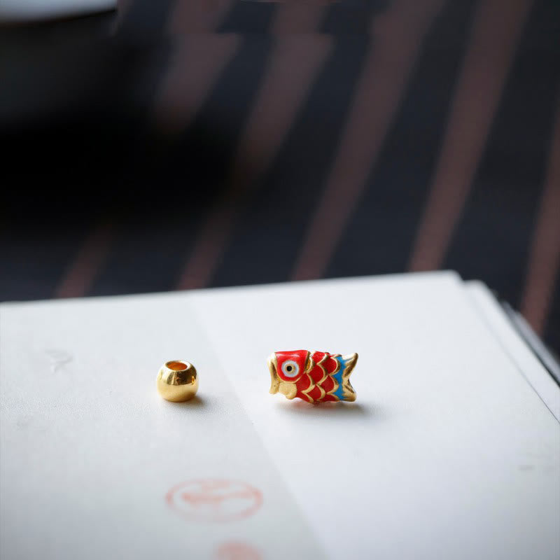 Pulsera positiva de pez koi con lazurita y piedras de Buda