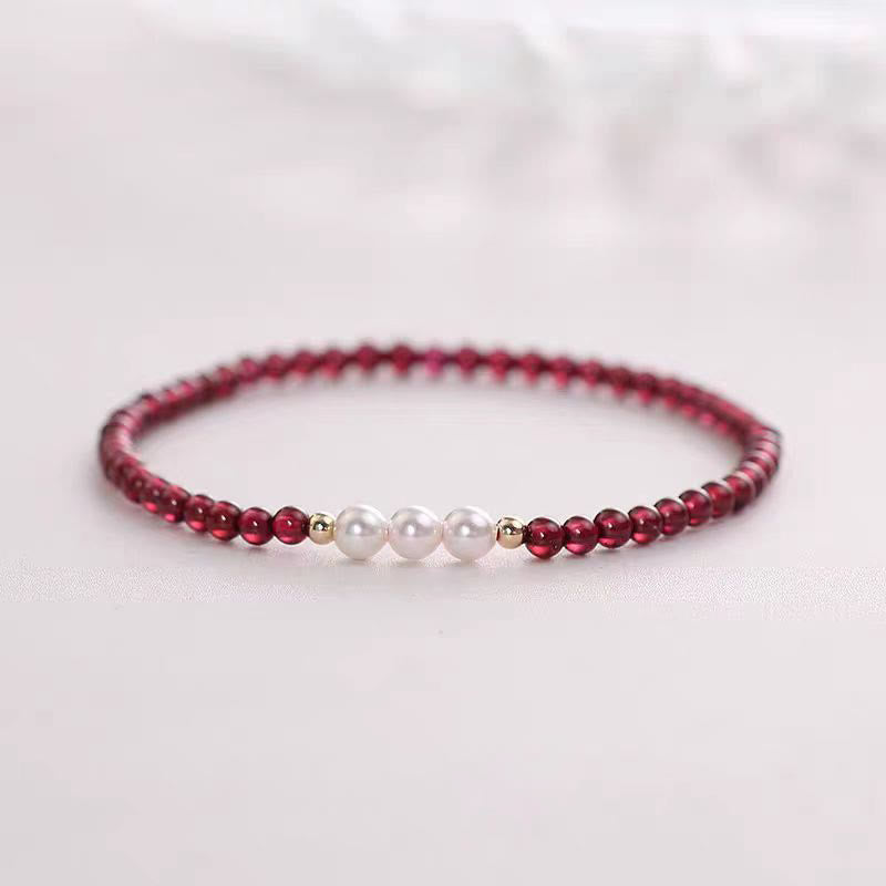 Pulsera protectora de perlas de granate pequeñas naturales de Buddha Stones