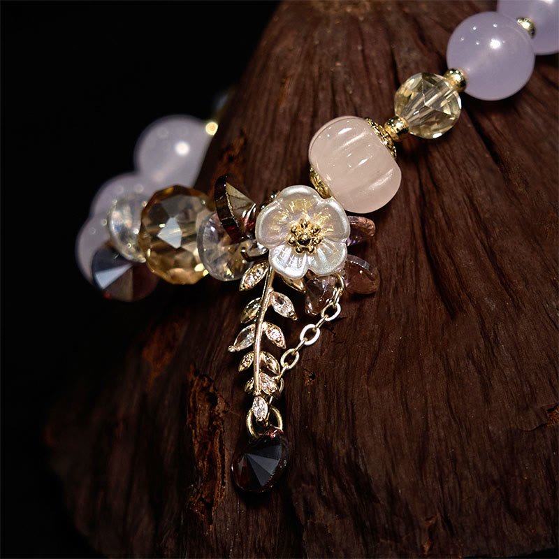 Pulsera curativa de amatista, cristal azul y piedra solar con aventurina verde.