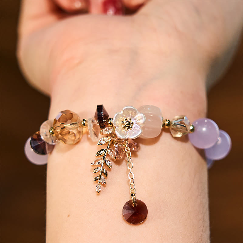 Pulsera curativa de amatista, cristal azul y piedra solar con aventurina verde.