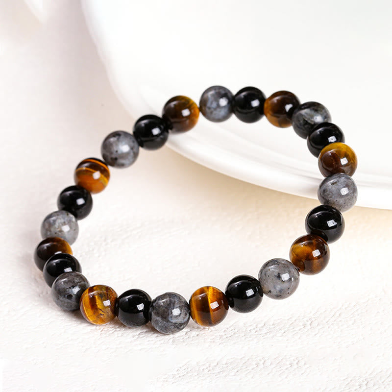 Pulsera de protección con piedras de Buda, ojo de tigre, piedra brillante negra, cuentas de vidrio negro, obsidiana copo de nieve, roca de lava y rodonita.