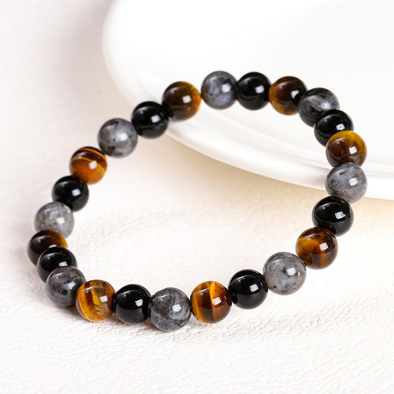 Pulsera de protección con piedras de Buda, ojo de tigre, piedra brillante negra, cuentas de vidrio negro, obsidiana copo de nieve, roca de lava y rodonita.