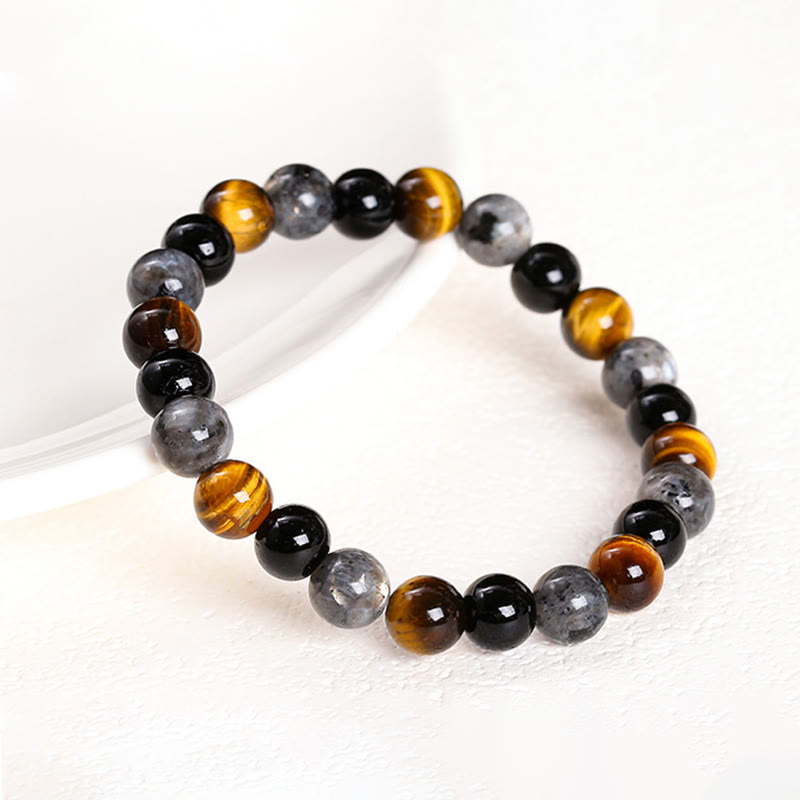 Pulsera de protección con piedras de Buda, ojo de tigre, piedra brillante negra, cuentas de vidrio negro, obsidiana copo de nieve, roca de lava y rodonita.